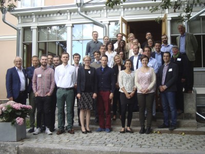 The Helsinki Seminar's Young Professionals on the steps of Munkkiniemi Manor
